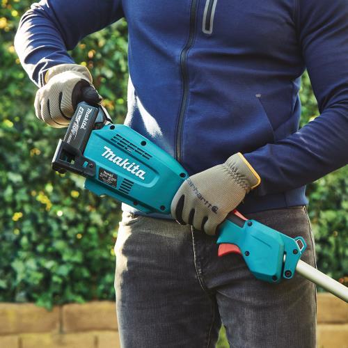Makita XUX02SM1X4 18V LXT® Lithium‑Ion Brushless Cordless Couple Shaft Power Head Kit w/ 13" String Trimmer & 10" Pole Saw Attachments (4.0Ah)